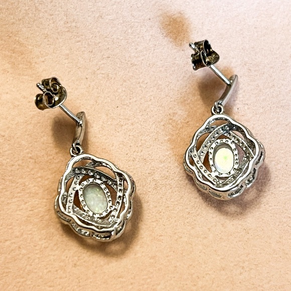 Lab created opals set in silver earrings. - Picture 4 of 6